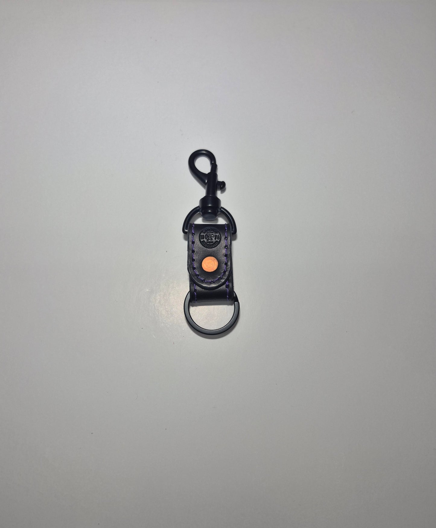 Black With Purple Stitching Bolt Snap Keychain