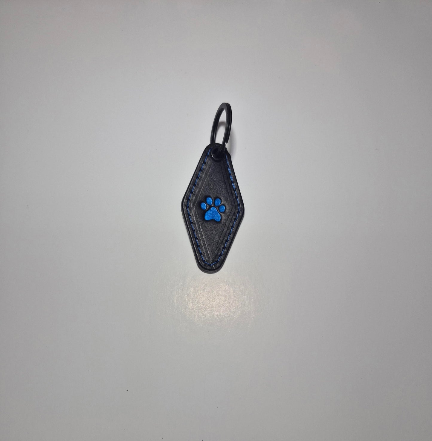 Blue Paw Print Hotel Keychain